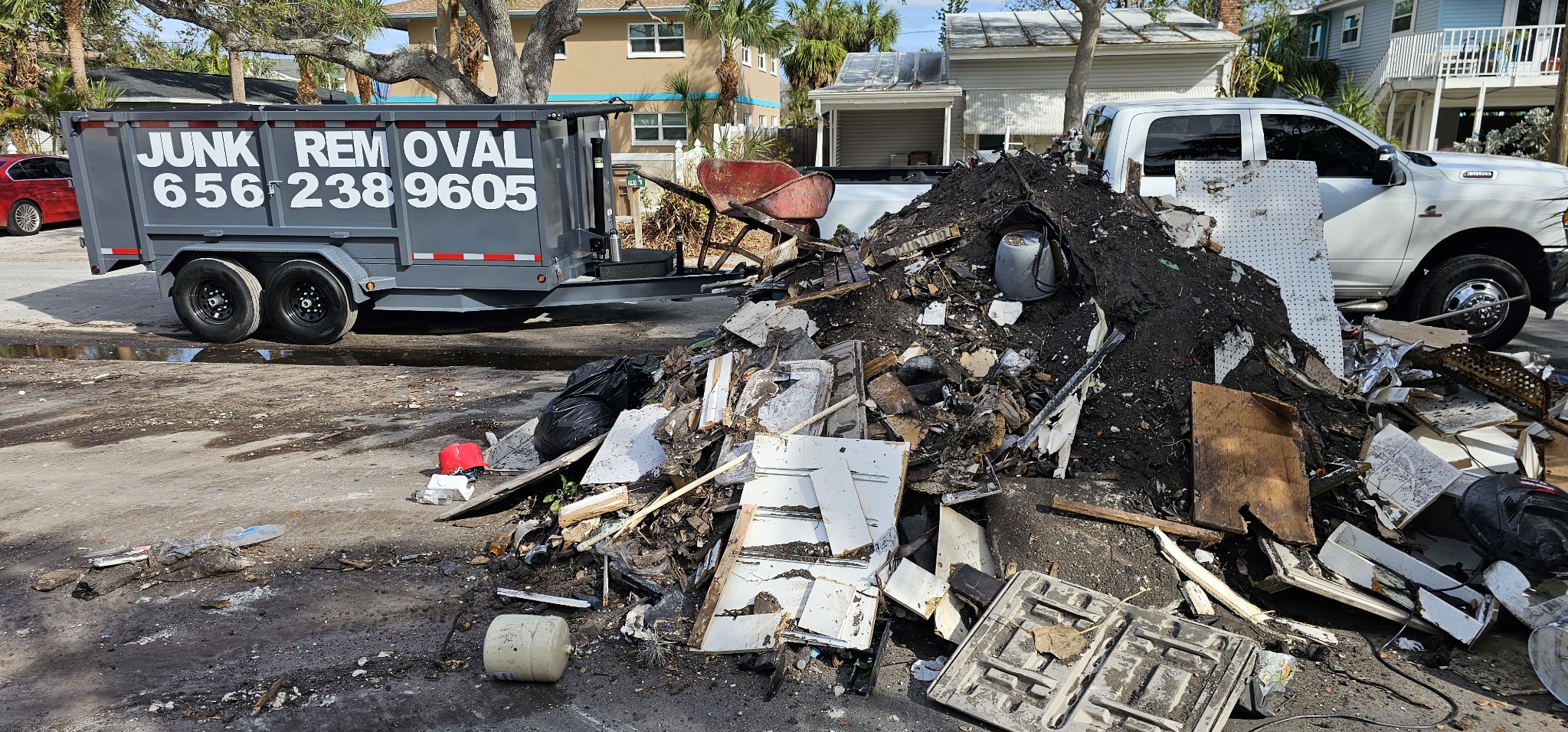 Truck and Trailer with Piles of Junk